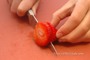 Little Chef A cutting strawberries