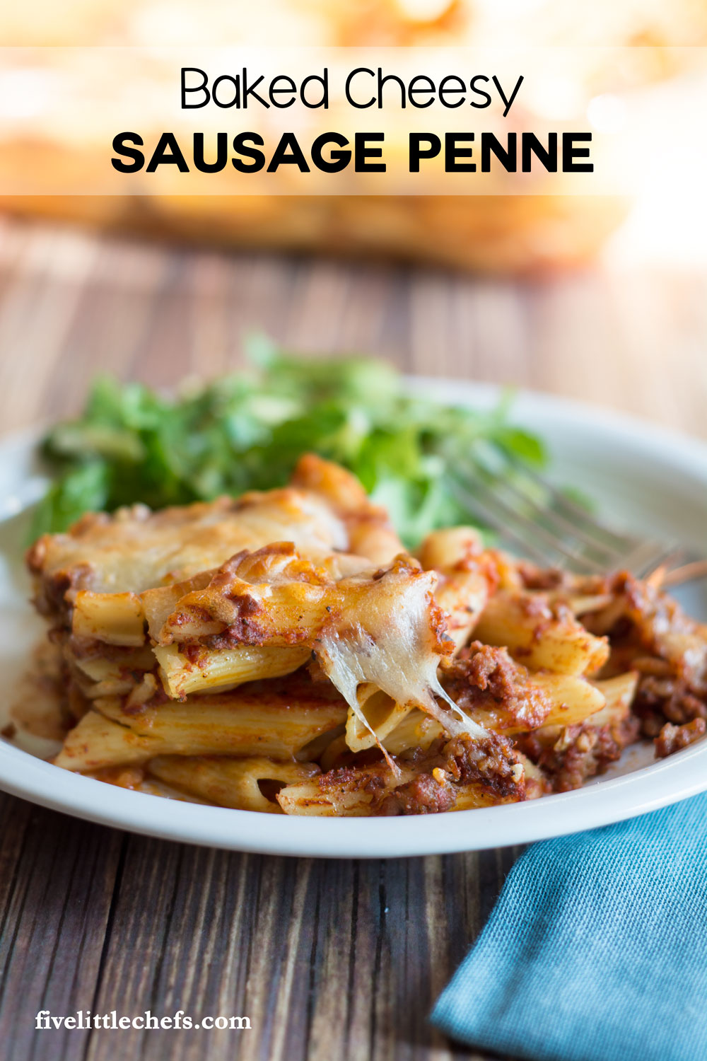 Baked Cheesy Sausage Penne is ultimate comfort foods. Use penne pasta, italian sausage and lots of mozzerella cheese to make it as cheesy as you want. Dinner is easy on the table within an hour, making for a great weeknight meal.