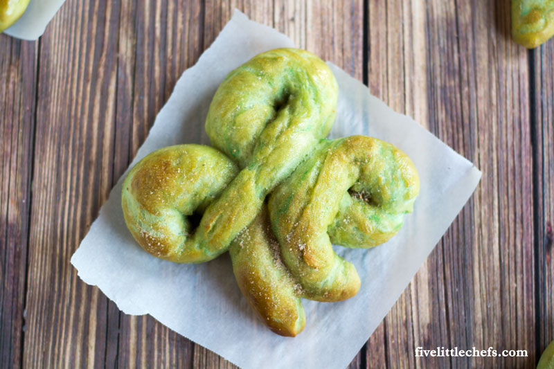 Homemade St. Patrick's Day Cinnamon Sugar Soft Pretzels are a great way to celebrate the holiday. Easy recipe with step by step instructions! Let the kids help or surprise them with this after school snack!