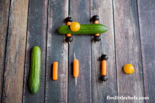 Create a veggie mobile to entice your kids to eat more vegetables.